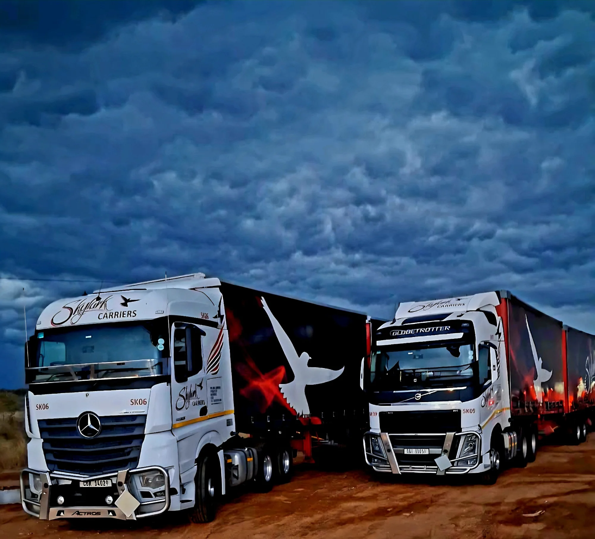 Skylark Carriers trucks under storm clouds